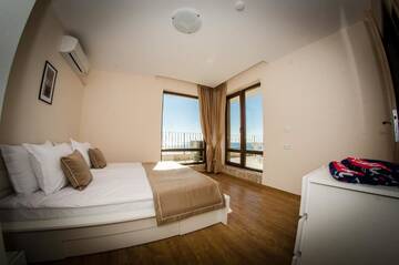 Фото номера Апартаменты с 2 спальнями и балконом Курортные отели Premier Fort Beach Resort г. Солнечный Берег 5