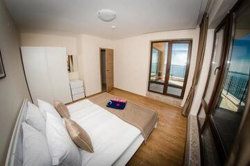 Фото номера Апартаменты с 2 спальнями и балконом Курортные отели Premier Fort Beach Resort г. Солнечный Берег 25