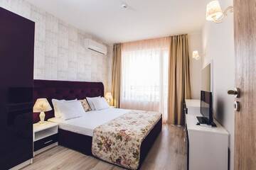 Фото номера Апартаменты с 1 спальней и балконом (для 5 взрослых) Отель Avenue Deluxe Hotel г. Солнечный Берег 2