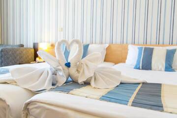 Фото номера Family Room (2 Adults + 2 Children 0-12 years) Отель RIU Helios - All Inclusive г. Солнечный Берег 5