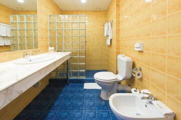Фото номера Family Room (2 Adults + 2 Children 0-12 years) Отель RIU Helios - All Inclusive г. Солнечный Берег 11