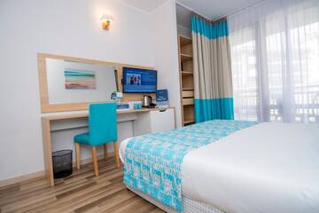 Фото номера Двухместный номер с балконом (для 2 взрослых) Курортные отели Nevis Resort &amp; Aqua Park - All Inclusive г. Солнечный Берег 6
