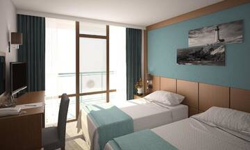 Фото номера Семейный люкс с балконом (для 2 взрослых и 2 детей) Отель Hotel Pomorie Sun г. Солнечный Берег 4
