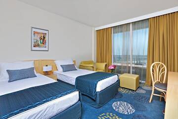 Фото номера Семейный люкс (для 2 взрослых и 2 детей) Отель Hotel Globus г. Солнечный Берег 6