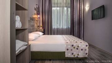 Фото номера Семейный люкс с 2 спальнями (для 4 взрослых) Курортные отели HI Hotels Imperial Resort г. Солнечный Берег 6