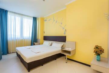 Фото номера Люкс с 1 спальней и балконом (для 2 взрослых + 2 детей) Отель Blue Pearl Hotel - Ultra All - Inclusive г. Солнечный Берег 5